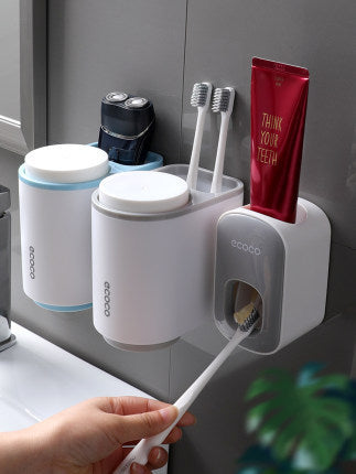  Close-up of automatic toothpaste dispenser.